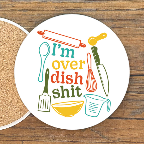 A white coaster with a colorful graphic design featuring various kitchen utensils and text.