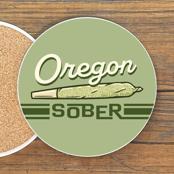 Colorful 4-Inch Oregon Sober Cannabis Drink Coaster featuring a playful design, perfect as funny coffee table coasters. Ideal for protecting surfaces with style.