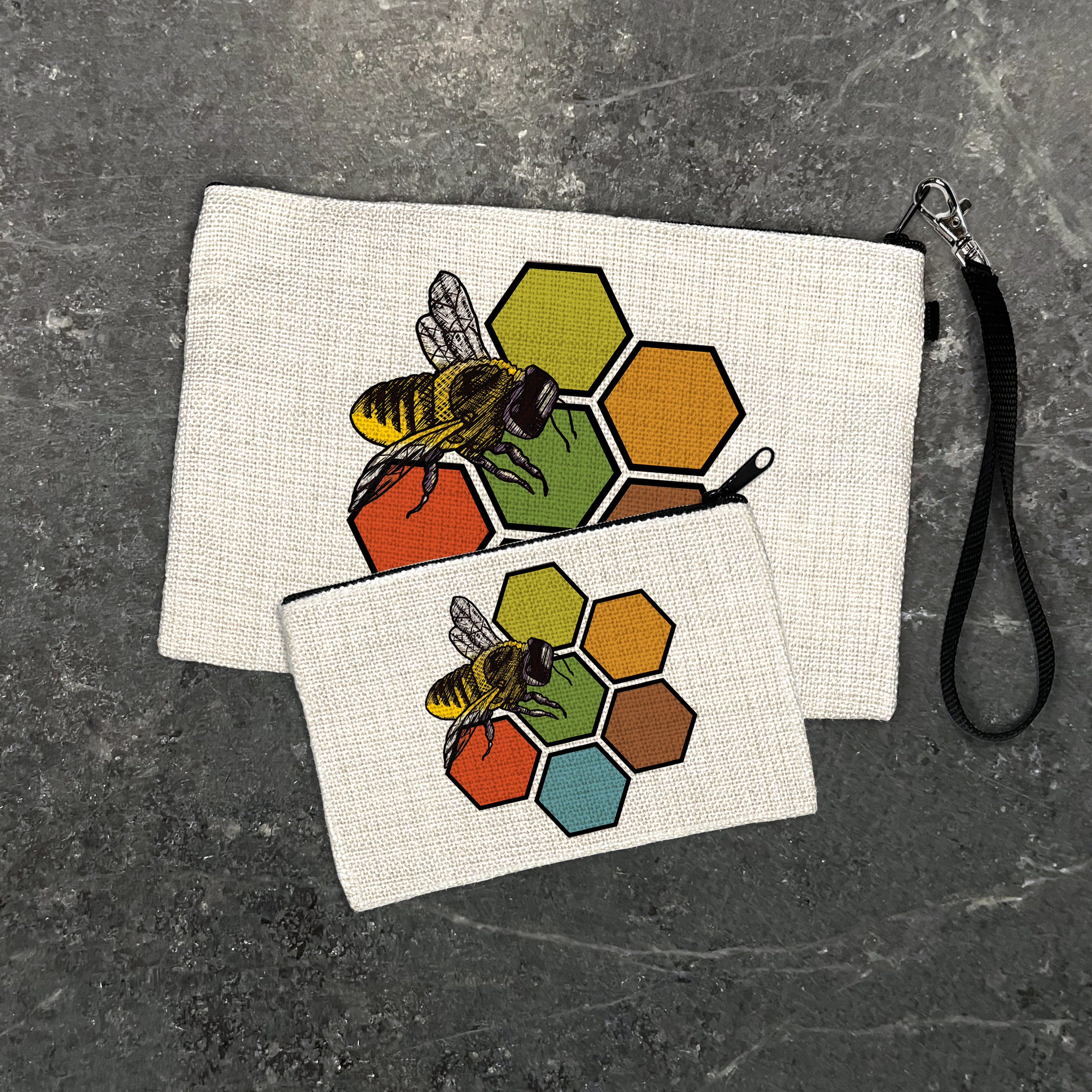 Adorable Honeybee Zipper Pouch featuring a vibrant design with honeybees and hexagons, perfect for organizing travel essentials, cosmetics, and more in two stylish sizes.
