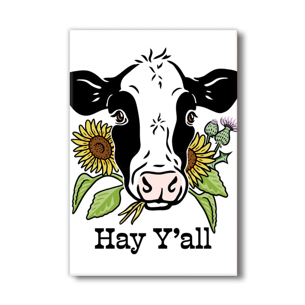 Hey Y’all Cow Magnet featuring a friendly cow surrounded by sunflowers, perfect for adding charming farmhouse decor to your fridge.