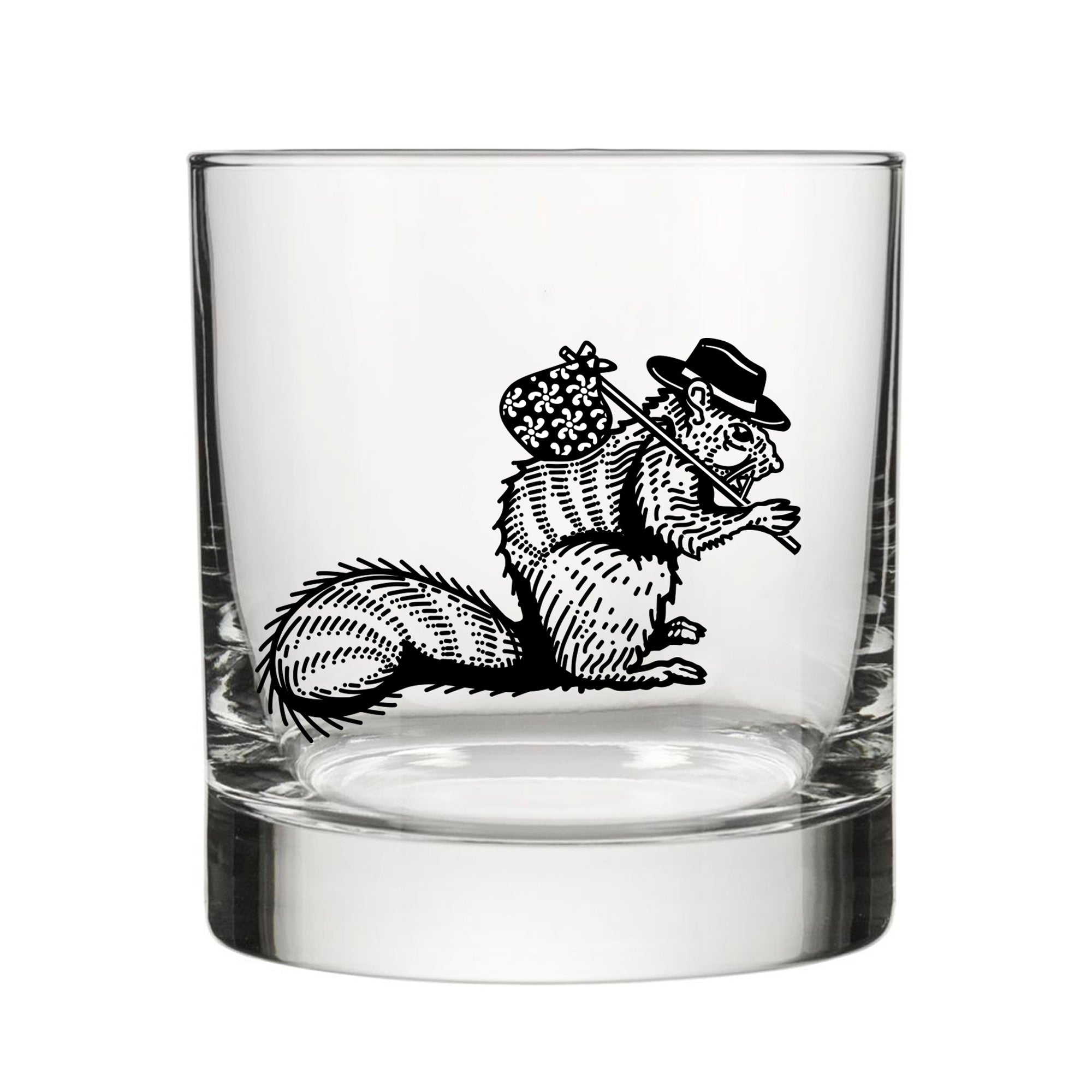 Close-up of a unique whiskey glass featuring a hobo squirrel illustration. The glass is clear and showcases the detailed design perfectly against a white background.