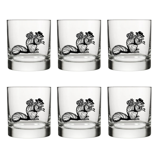A collection of six unique whiskey glasses featuring intricate hobo squirrel designs. The glasses are clean and empty, arranged neatly for display.