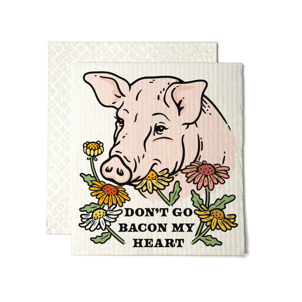 Funny Pig Swedish Dishcloth featuring a delightful pig and flowers, perfect for sustainable kitchen use while adding a whimsical touch to your cleaning routine.