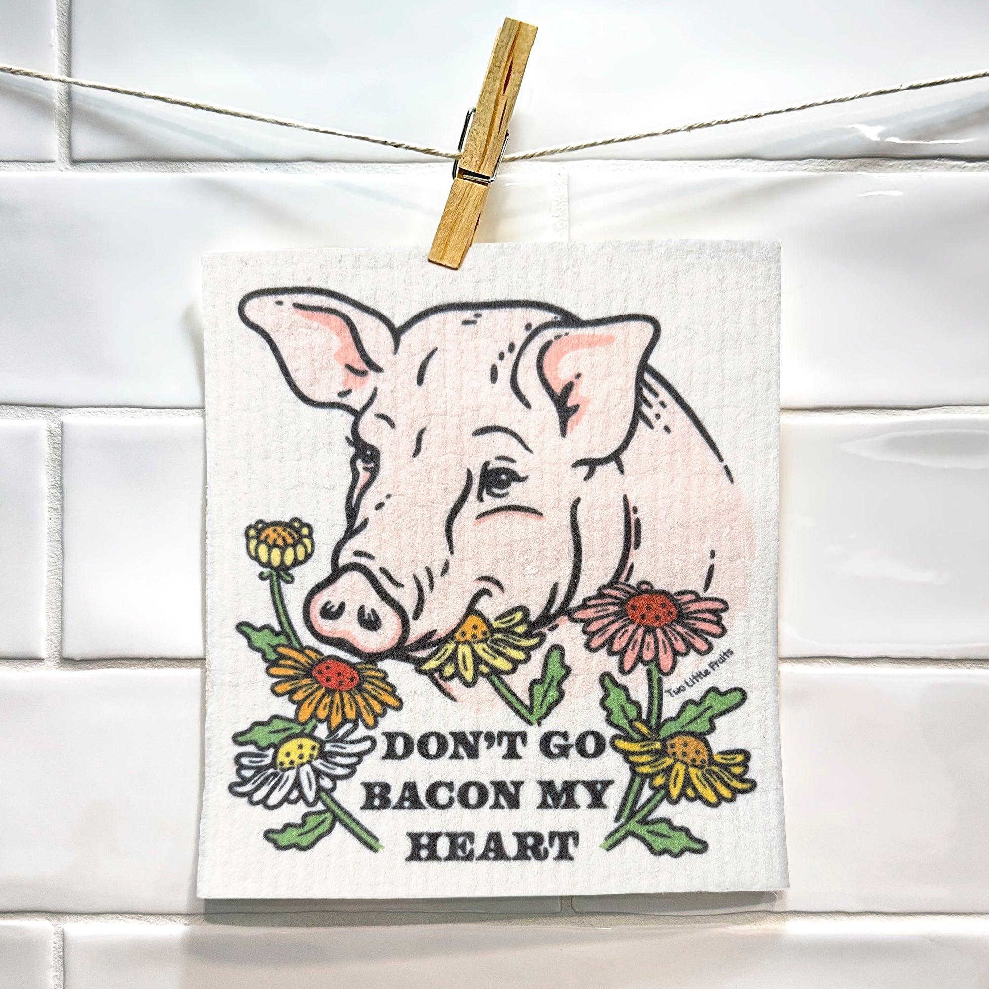 Eco-Friendly Swedish Dishcloth - Don't Go Bacon My Heart Pig design with flowers, ideal for sustainable cleaning in the kitchen.
