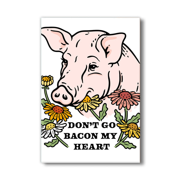 Cute pig magnet featuring a charming pig illustration surrounded by bright flowers and the text 'Don't Go Bacon My Heart'. Perfect for adding humor to your fridge or office space.