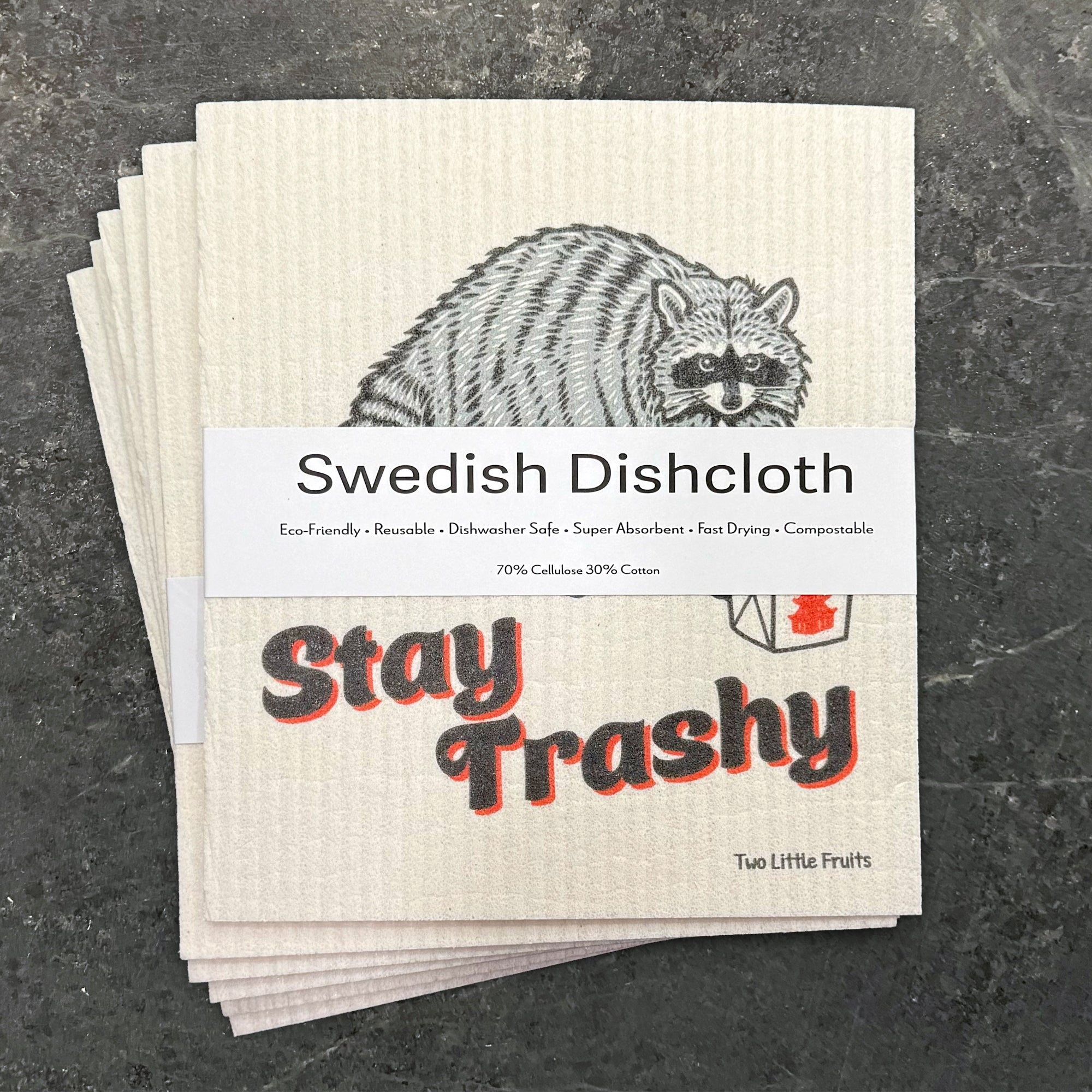 Raccoon Dish Rag - Eco-Friendly, Biodegradable Swedish Dishcloth stacked with a label highlighting its durability and compostability.
