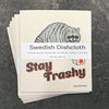 Raccoon Dish Rag - Eco-Friendly, Biodegradable Swedish Dishcloth stacked with a label highlighting its durability and compostability.