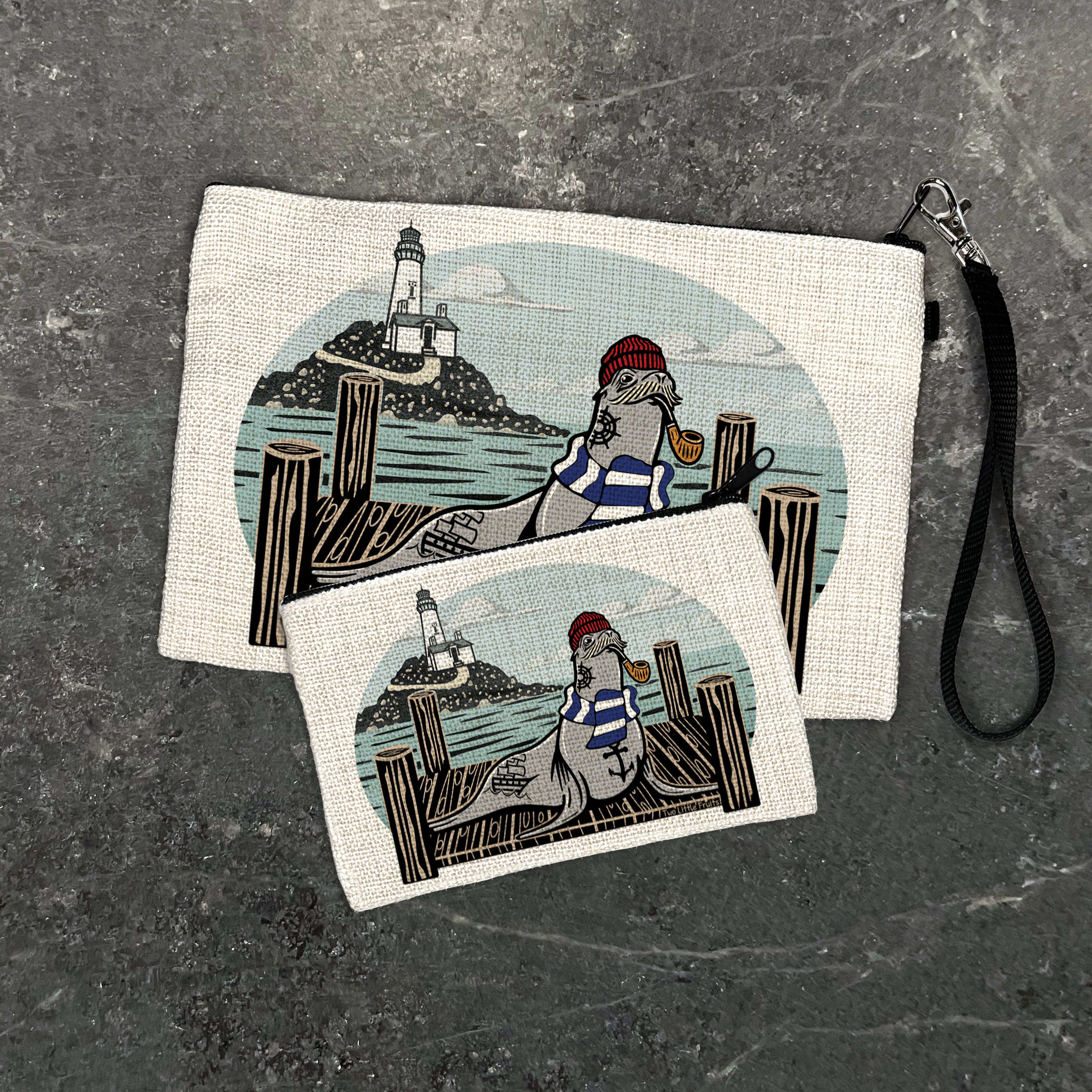Cheerful Sea Lion Zipper Pouch, a stylish and practical linen cosmetic bag, featuring a playful sea lion design with a lighthouse backdrop, perfect for organizing your essentials.