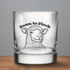 Another view of a Funny Lamb Whiskey Glass with the lamb design and text 'Down to Flock,' designed for a charming drink experience.
