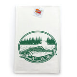 a white towel with a green and white design depicting a fish swimming in a river surrounded by trees.