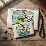Duck Zipper Pouch lifestyle — hand-illustrated linen cosmetic and pencil bag