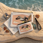 Pelican Zipper Pouch — hand-illustrated linen cosmetic and pencil bag, lifestyle