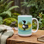 Loon Coffee Mug — hand-illustrated 15oz ceramic mug, lifestyle