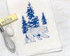 Adorable Bear Kitchen Towel – Hand-Drawn Design in Royal Blue depicting a delightful bear walking through pines, a charming addition to your kitchen essentials.