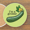 Cute Garden Zucchini Table Drink Coaster – Colorful 4” Ceramic Coaster featuring a whimsical zucchini design with the text 'I’m a grower'. Perfect for adding a playful touch to your decor, these cute garden coasters are ideal for protecting surfaces.