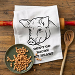 Bacon Lover Gifts - Cotton Kitchen Towel featuring a cute pig design and the phrase 'Don’t Go Bacon My Heart'. Perfect for bacon lovers gifts, this humorous towel adds charm to any kitchen.