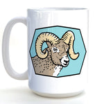 A white ceramic mug with a graphic of a ram's head on it.