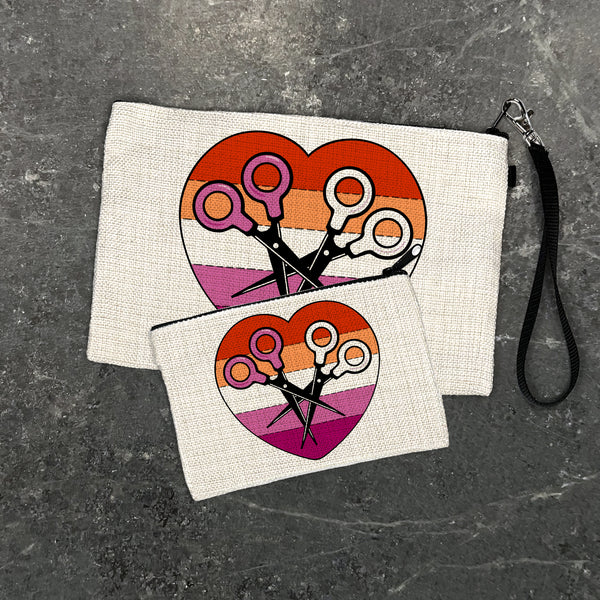 Lesbian Pride Accessories Scissor Heart Zipper Pouch showcasing a fun and stylish design in two sizes, perfect for organizing essentials with flair.