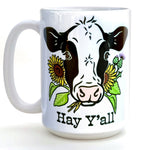Hey Y'all Cow Coffee Mug featuring a friendly cow design with sunflowers, perfect for coffee lovers. 15 oz heavy-duty ceramic, microwave and dishwasher safe.