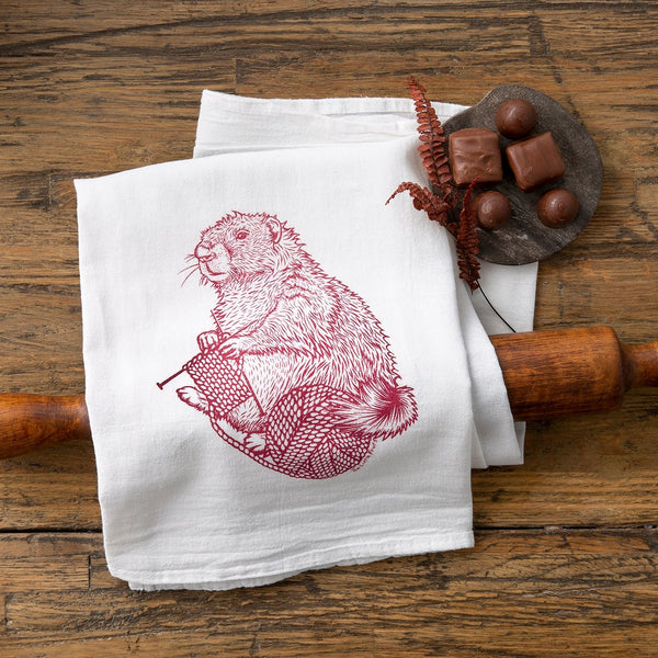 Colorful Knitting Kitchen Towel showcasing a charming knitting marmot, ideal for brightening up your kitchen space and making dish drying fun.