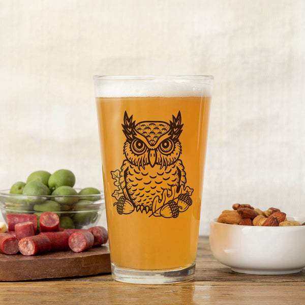 Close-up of the Owl Pint Glass showcasing its detailed owl artwork, perfect for nature lovers and beer enthusiasts.