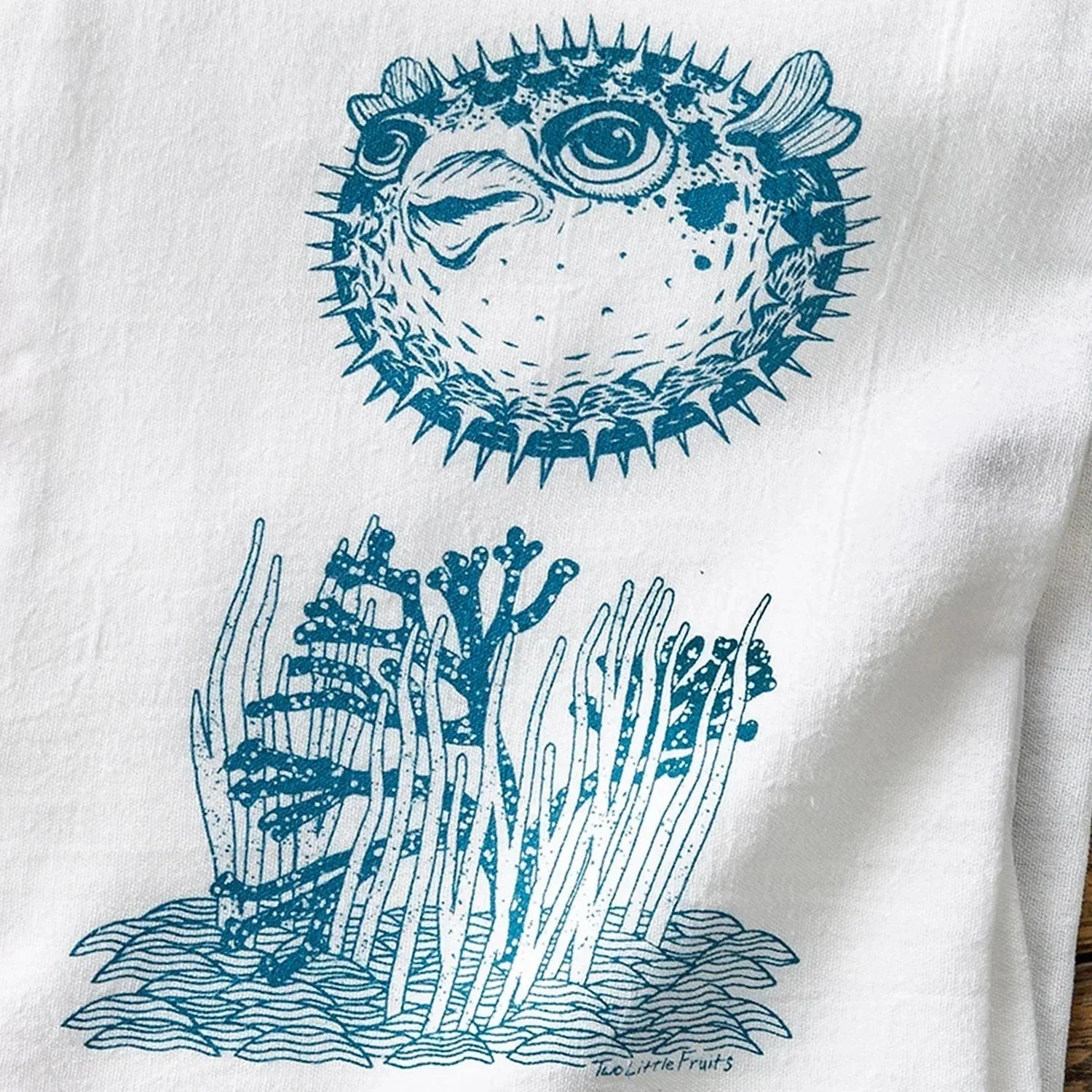 Pufferfish illustrated tea towel by Two Little Fruits