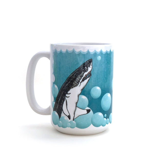 Funny shark mug with a playful design featuring a great white shark surrounded by bubbles, perfect for enjoying your favorite beverages.