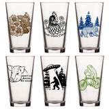 Unique Beer Glass Set - Mix And Match 6 Animal 16 Oz Pint Glasses featuring an assortment of vibrant designs with a bear, chicken, pig, and UFO, perfect for your craft beer collection.