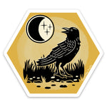 Unique Black Crow Sticker featuring a black crow against a vibrant background with a crescent moon, perfect for personalizing laptops and journals. This 3-inch waterproof vinyl design adds a charming and artistic touch to any collection.