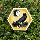 Unique Black Crow Sticker – 3 Inch Waterproof Vinyl Design featuring an artistic black crow against a vibrant yellow background, ideal for personalizing laptops and journals.