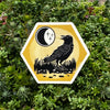 Unique Black Crow Sticker – 3 Inch Waterproof Vinyl Design featuring an artistic black crow against a vibrant yellow background, ideal for personalizing laptops and journals.