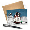 A whimsical dog greeting card featuring a pug in an astronaut suit on the moon with a rover in the background, highlighting the playful theme perfect for dog lovers.