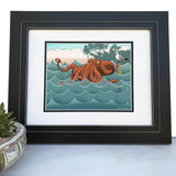 Bento The Octopus Art Print framed, showcasing a vibrant octopus design against a backdrop of ocean waves, perfect for home decor. Ideal octopus art print for art lovers.
