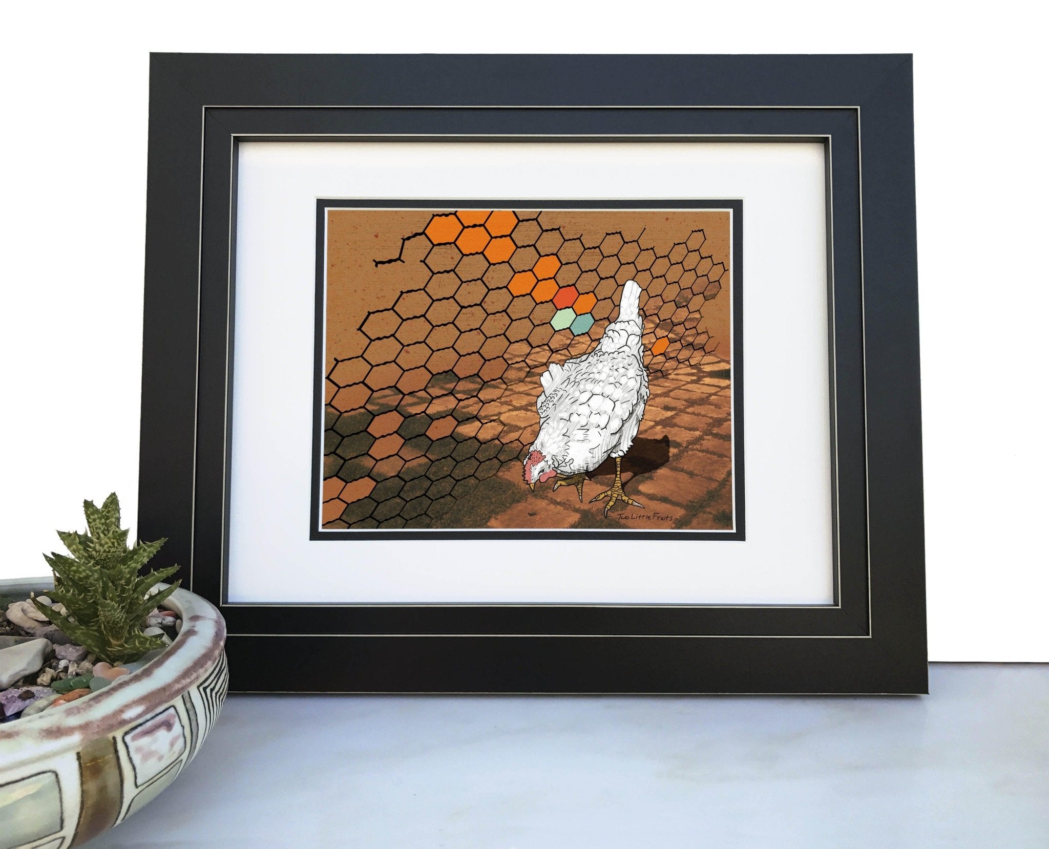 Framed chicken art print featuring a whimsical illustration of a chicken against a hexagonal background, showcasing vibrant colors and rustic charm, perfect for farm animal decor.