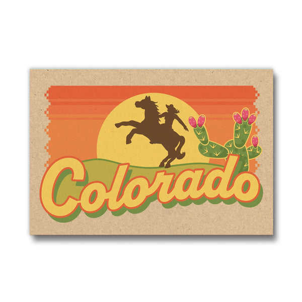Colorado Cowgirl Fridge Magnet featuring a vibrant sunset with a silhouette of a horse and rider, and colorful cacti, perfect for adding a touch of Western charm to your kitchen.