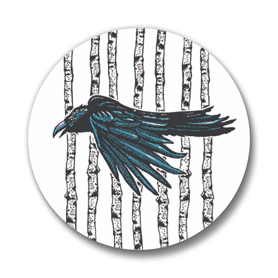 Close-up of a crow button pin showcasing artistic details of a crow against a background of vertical lines.