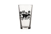 Festive setting with the Dog Beer Glass surrounded by beer and snacks, adding a fun touch to any celebration.