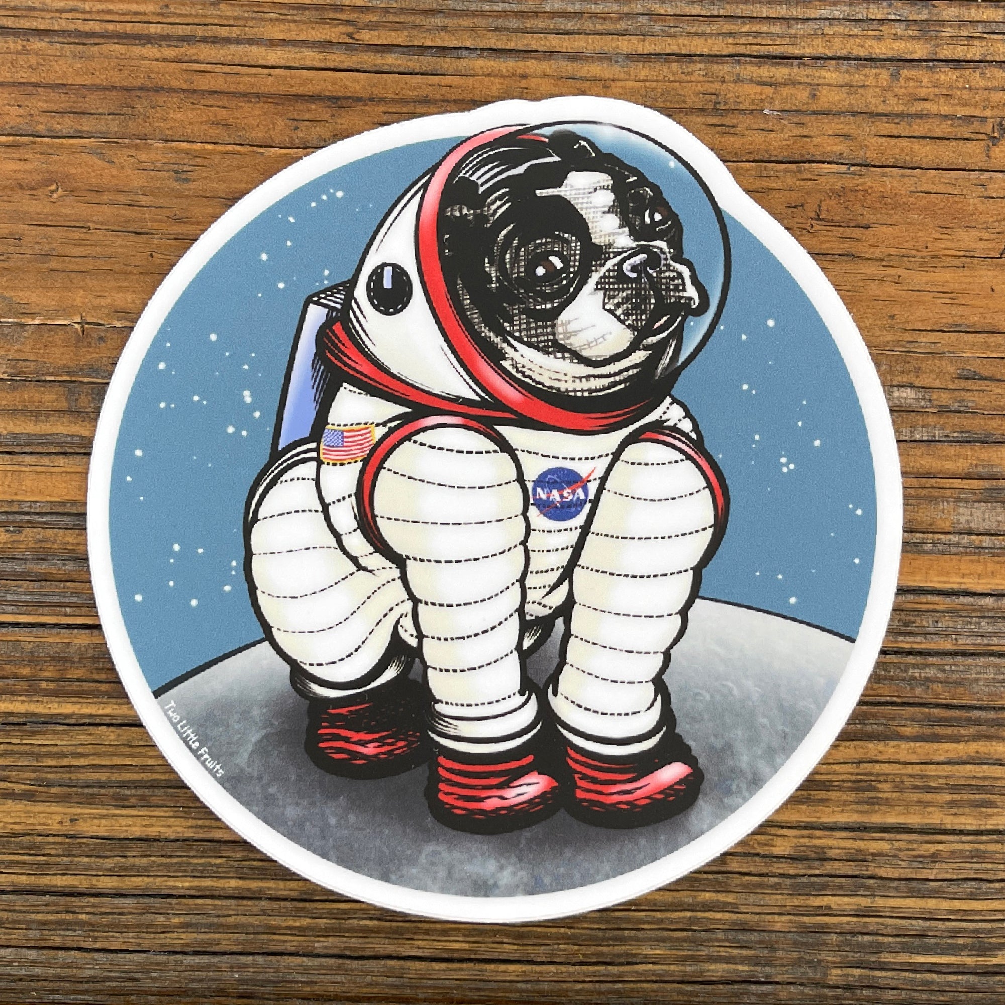 Close-up view of the Rover The Space Dog Die Cut Sticker, showcasing an adorable astronaut dog in a space setting. A must-have space dog sticker for dog lovers.