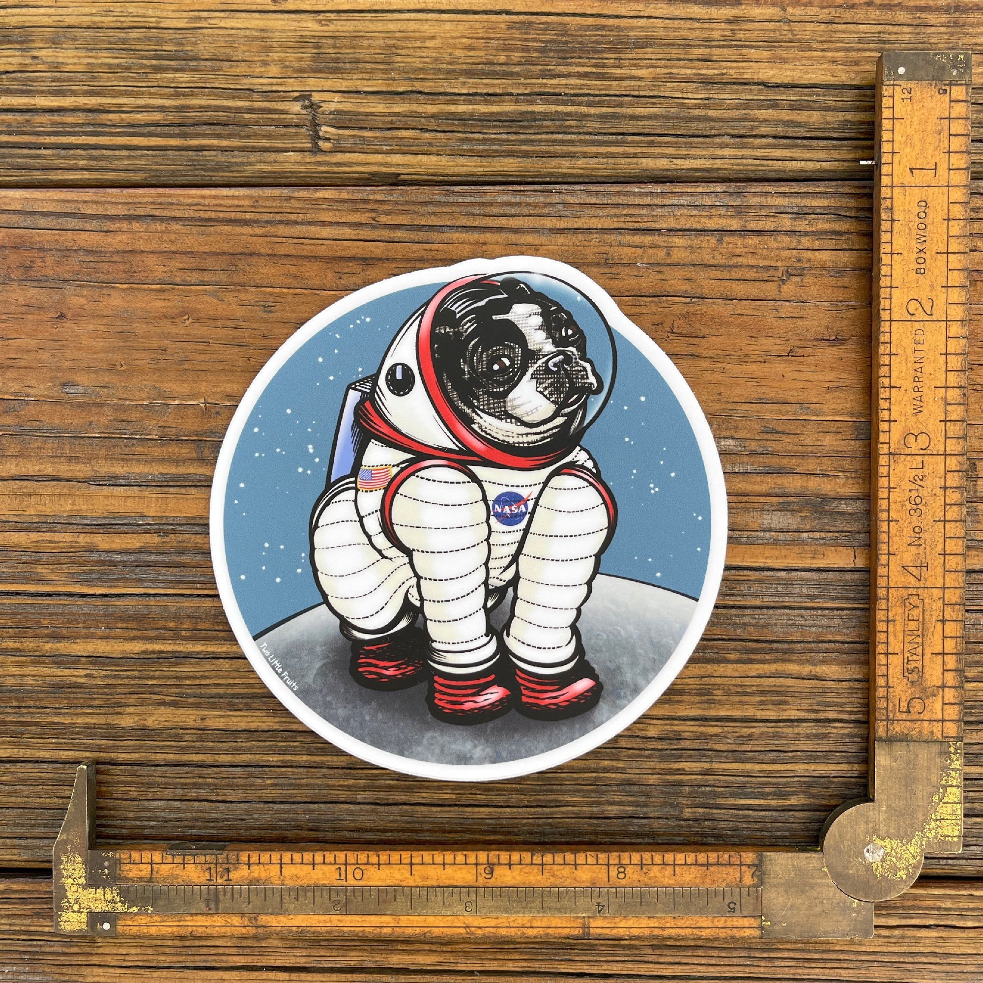 Rover The Space Dog Die Cut Sticker featuring a cute dog in an astronaut suit on the moon, perfect for showing off your personality. Ideal space dog sticker for decorations.