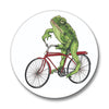 Frog Button Pin - Toadster The Frog, featuring a vibrant illustration of a frog on a red bicycle, highlighting its fun design and colorful details.