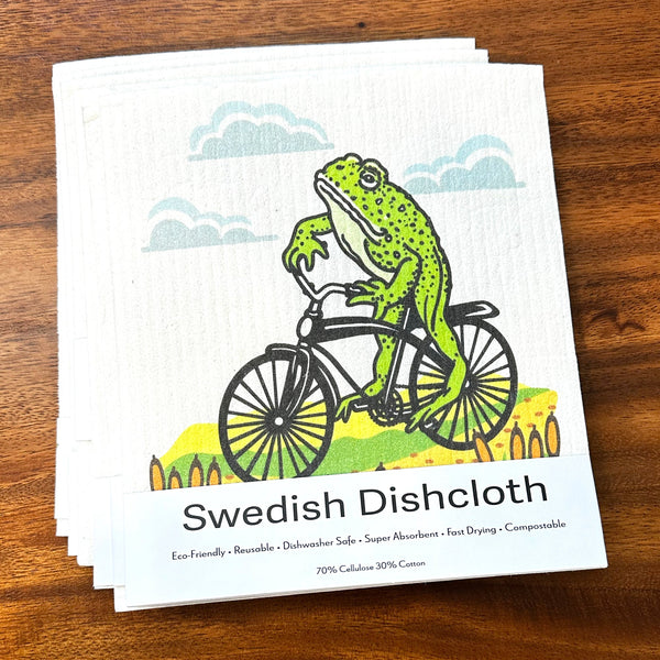 Stacked Frog On A Bike Swedish Dishcloths, these compostable kitchen cloths bring a lively touch to your cleaning routine.