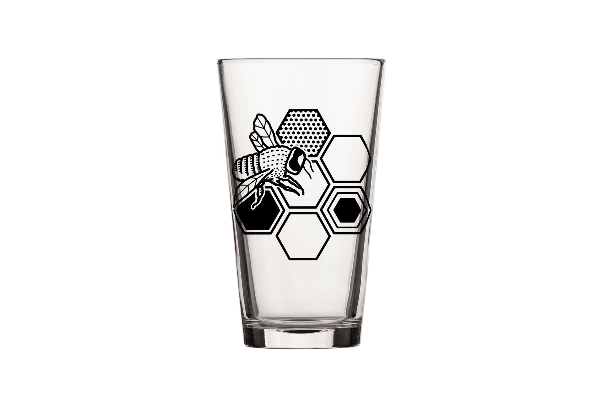 A single bee beer glass featuring a detailed illustration of a bee and honeycomb, ideal for enjoying your favorite beverages.