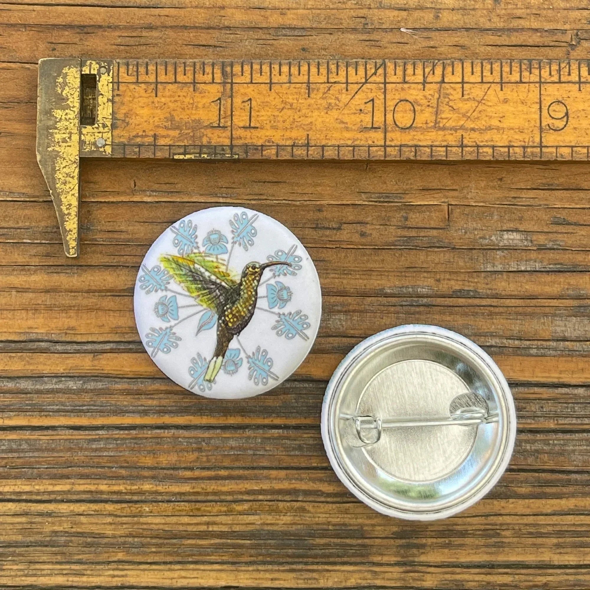 Hummingbird illustrated button pin by Two Little Fruits