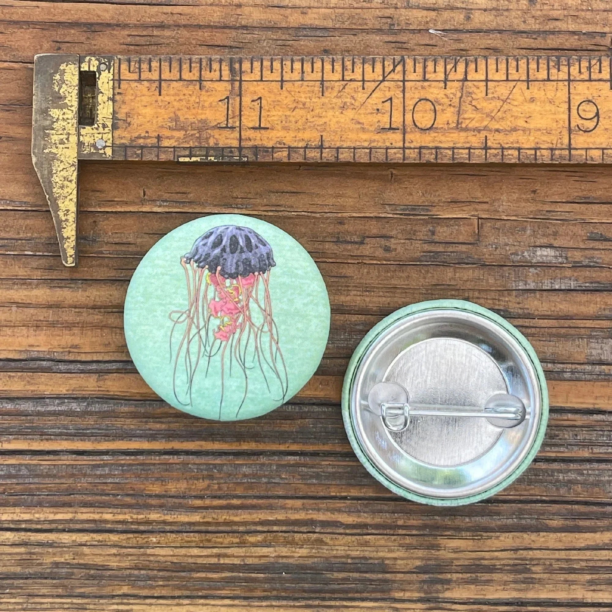 Jellyfish illustrated button pin by Two Little Fruits