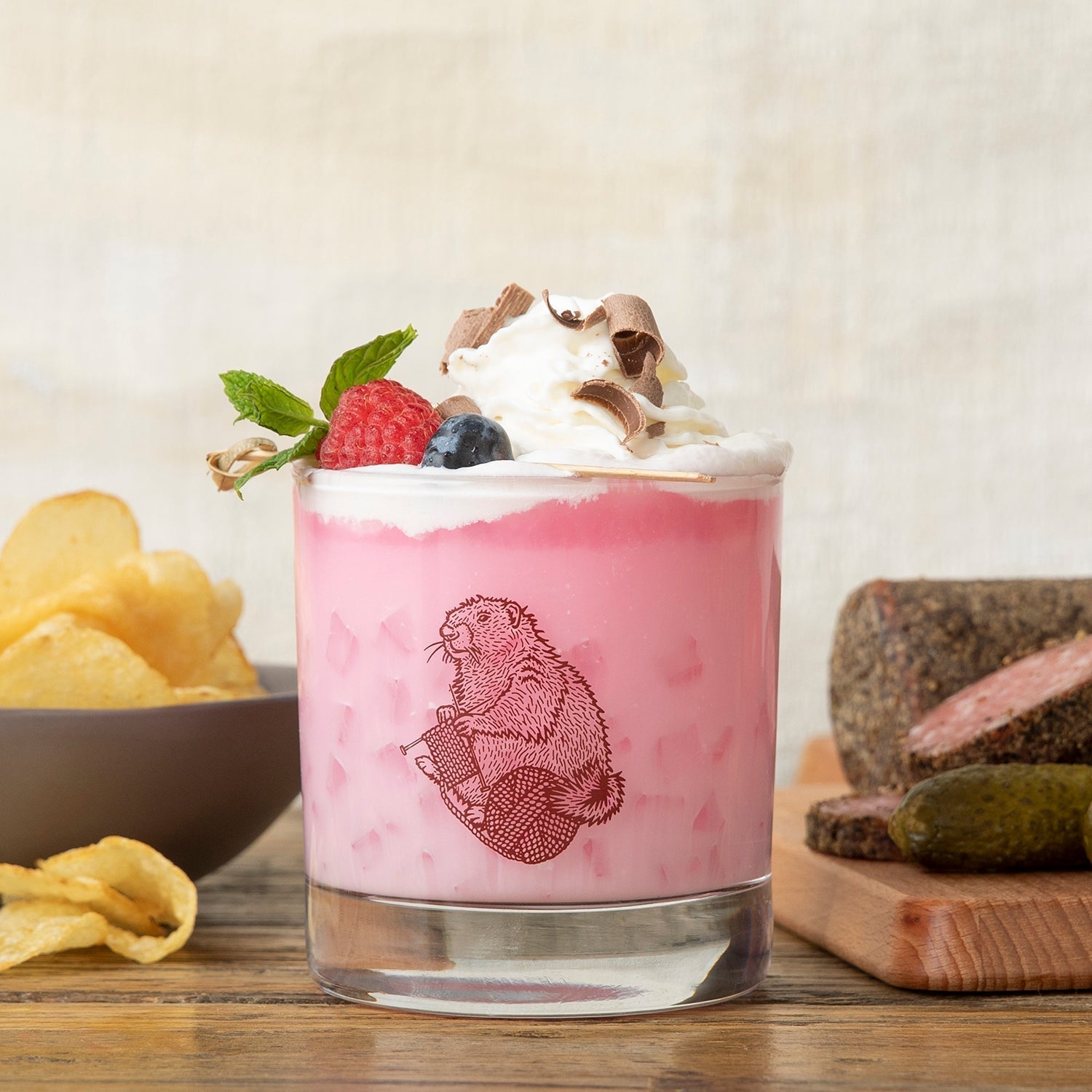 Mix and Match Your Own 6 Unique Whiskey Glass Set with a charming Knitting Marmot illustration, ideal for a playful beverage experience.