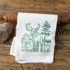 Moose Kitchen Towel showcasing a playful design of a hiking moose in boots near a trail sign, ideal for brightening up your kitchen, part of eco-friendly cotton kitchen towels.