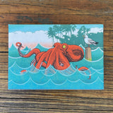 Bright and colorful octopus fridge magnet featuring a vibrant red octopus in the ocean, perfect for adding personality to your kitchen.