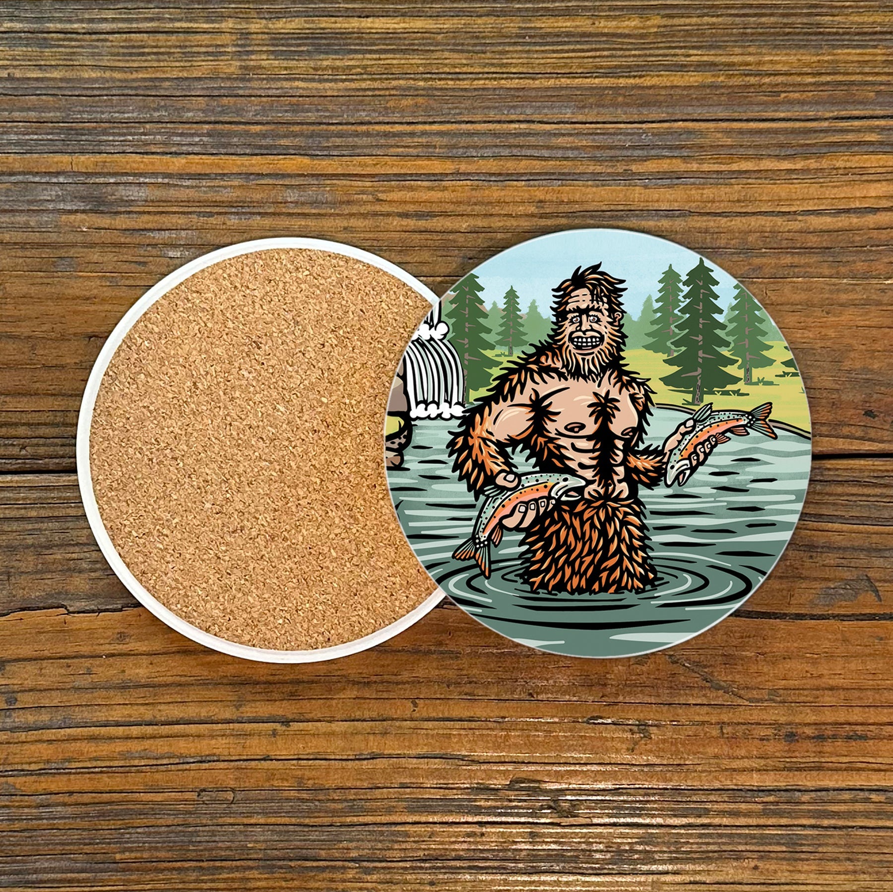 Colorful Sasquatch Drink Coaster showing a playful Sasquatch in a lake with fish, ideal for anyone looking to spice up their home decor with unique coffee table coasters.