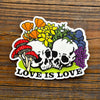 Skull and Flowers LGBTQ+ Pride Sticker, perfect queer pride accessory for expressing individuality.