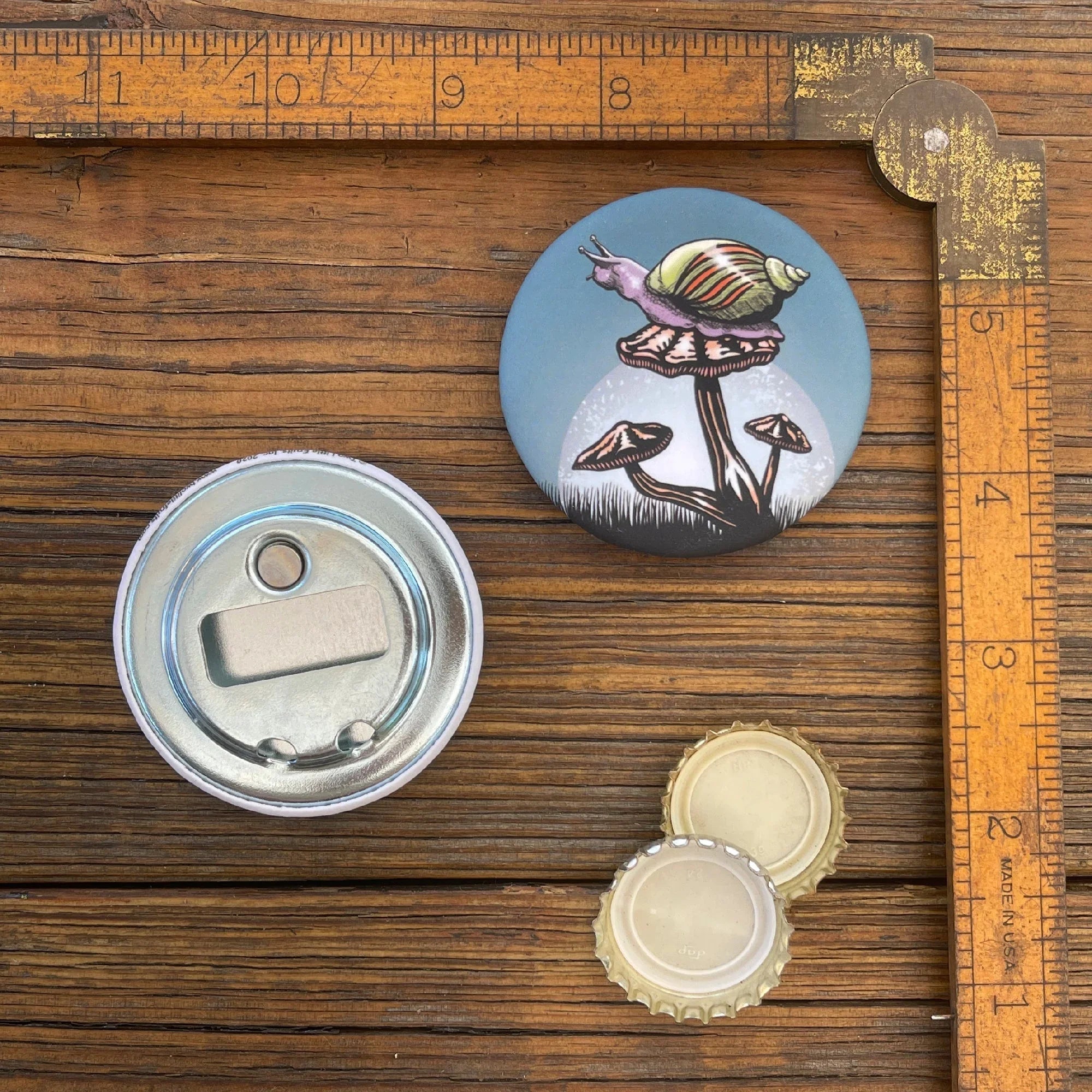 Snail illustrated magnetic bottle opener by Two Little Fruits